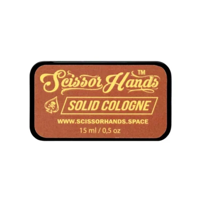 Brown solid cologne by Scissor Hands with a coffee fragrance in a convenient format.