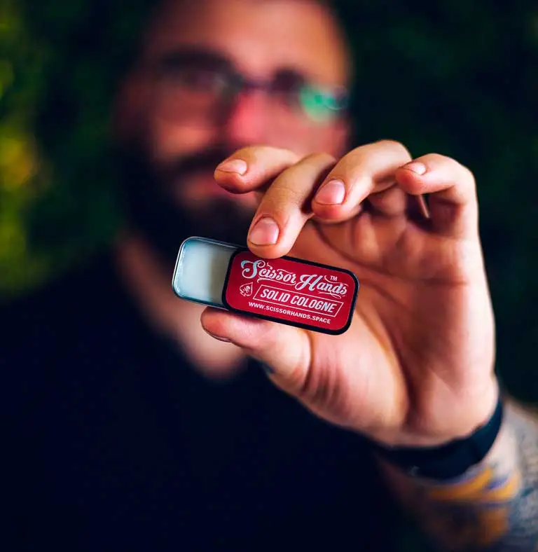 Red solid cologne by Scissor Hands — a bold fragrance inspired by energy and strength in a convenient format.