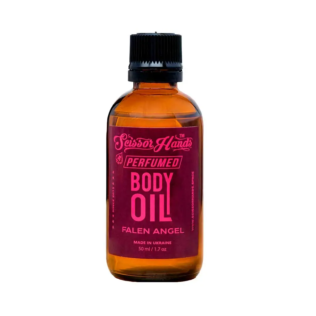 Fallen Angel perfumed dry body oil by Scissor Hands with notes of berries, vanilla, and patchouli.