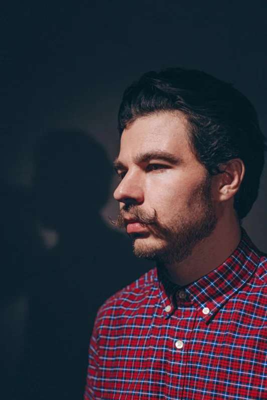 Stylish men's mustache — a classic look with thick curled mustaches styled using mustache wax.