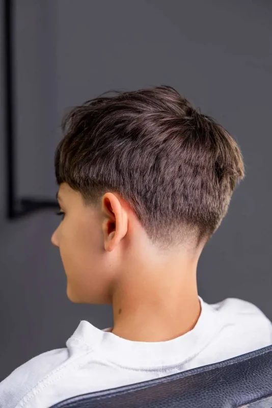 Finished children’s hairstyle with texture and volume after using Scissor Hands Liquid Wax