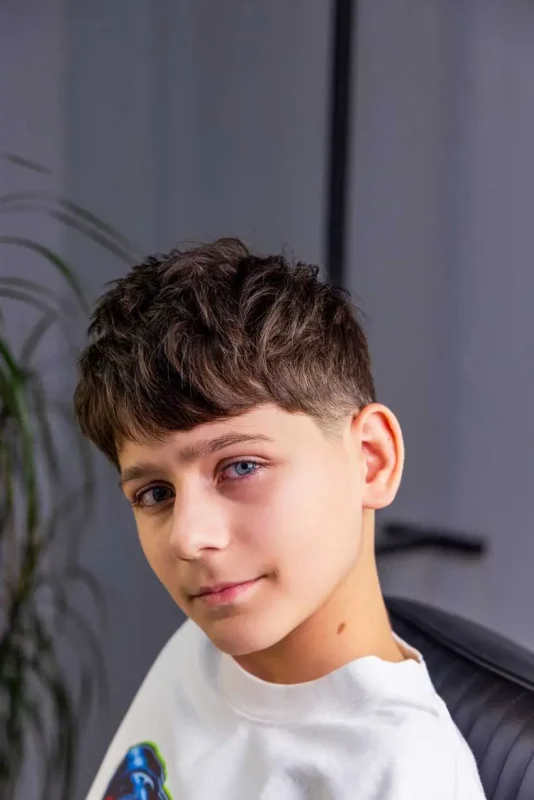 Finished children’s hairstyle with texture and volume after using Scissor Hands Liquid Wax